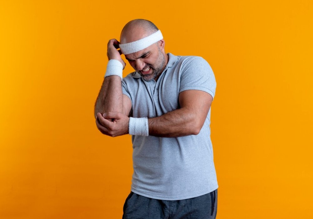 Got Tennis Elbow From Lifting? Do These Stretches First - GRIPZILLA